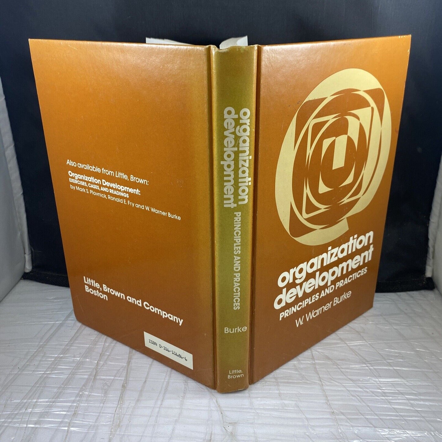 Organization development: Principles and practices Vintage 80s Textbook Orange