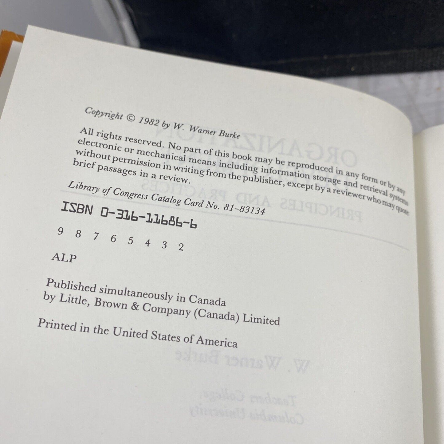 Organization development: Principles and practices Vintage 80s Textbook Orange