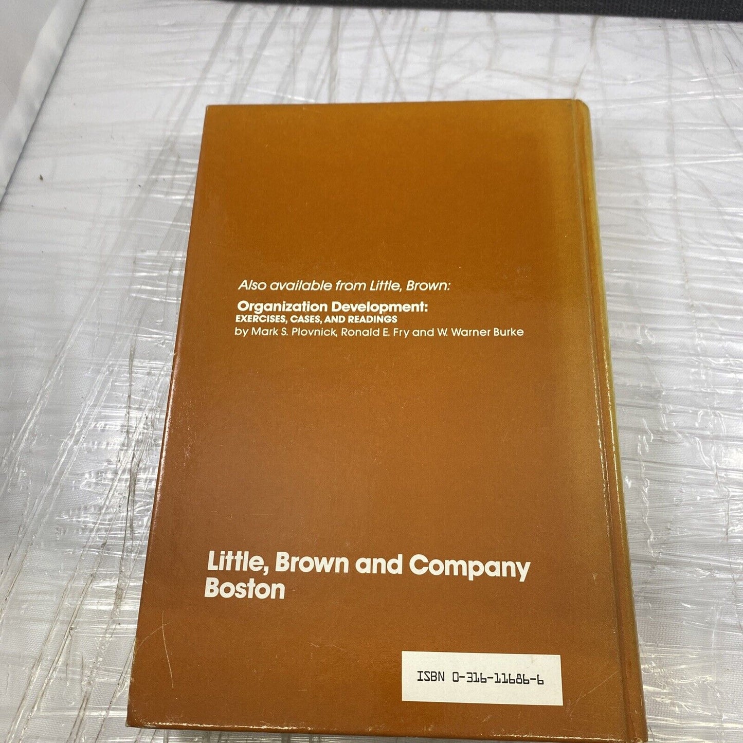 Organization development: Principles and practices Vintage 80s Textbook Orange