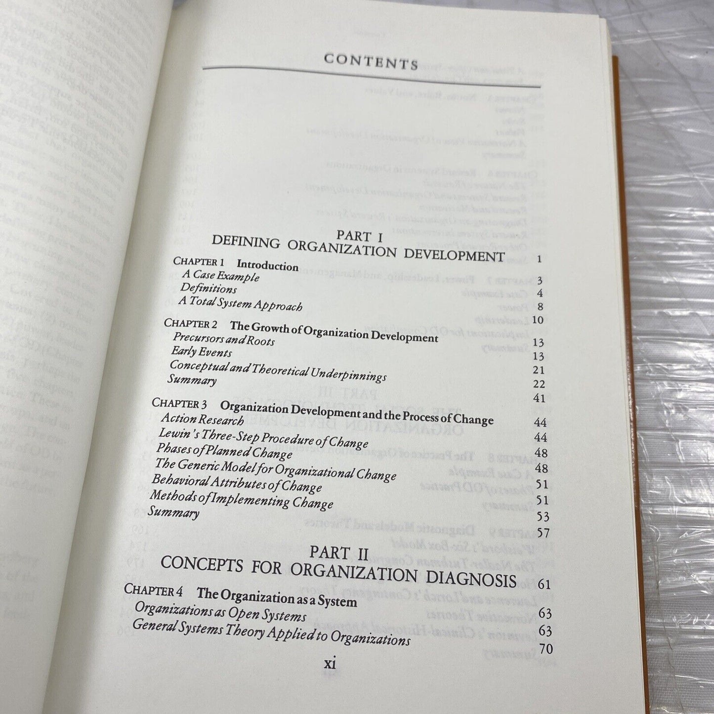 Organization development: Principles and practices Vintage 80s Textbook Orange