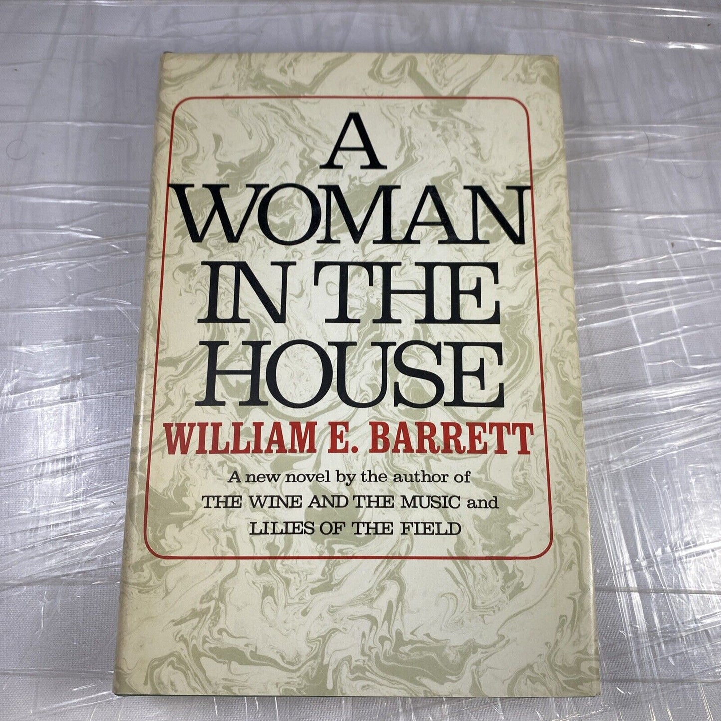 William E. Barrett A WOMAN IN THE HOUSE Book Club Edition