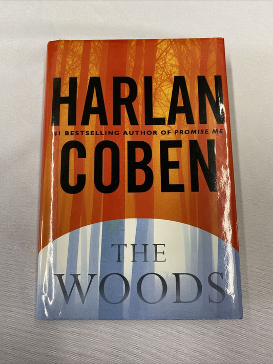 The Woods by Harlan Coben Hardcover with Dust Jacket.