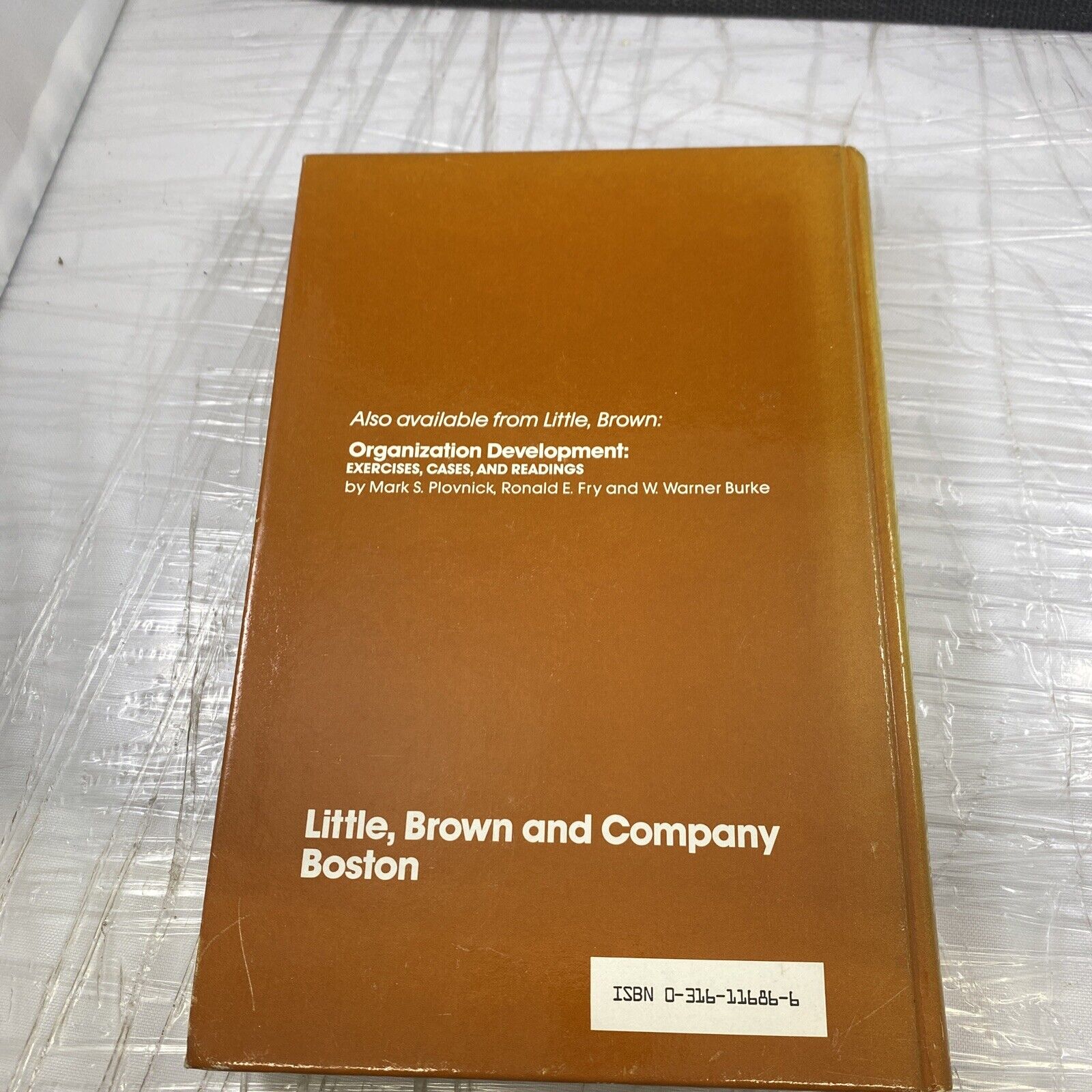 Organization development: Principles and practices Vintage 80s Textbook Orange