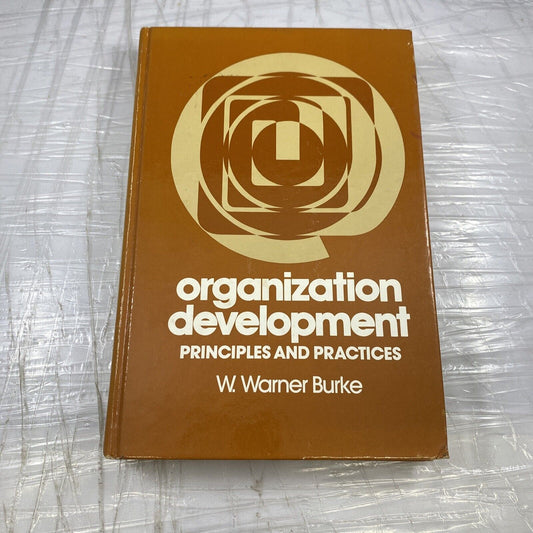 Organization development: Principles and practices Vintage 80s Textbook Orange