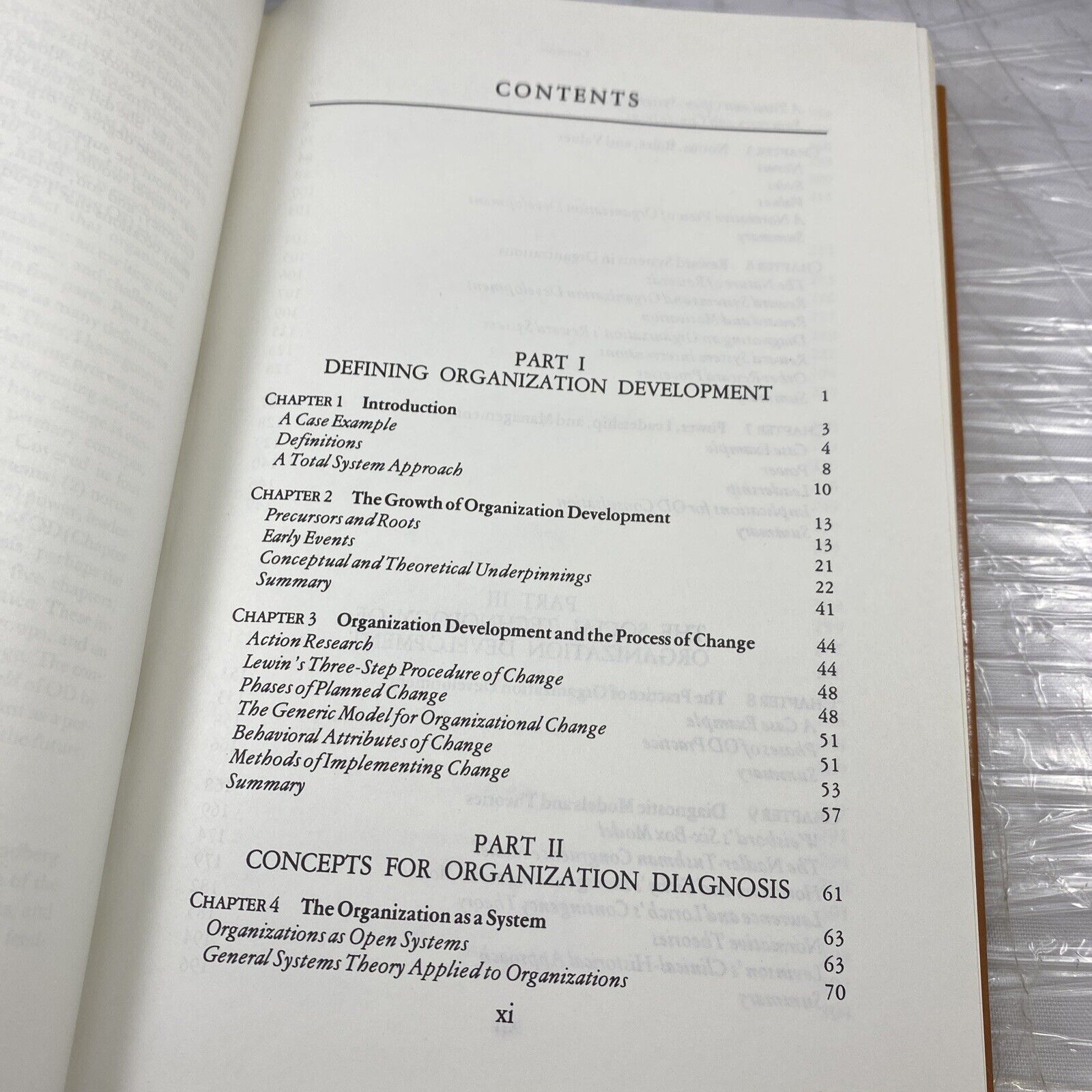Organization development: Principles and practices Vintage 80s Textbook Orange