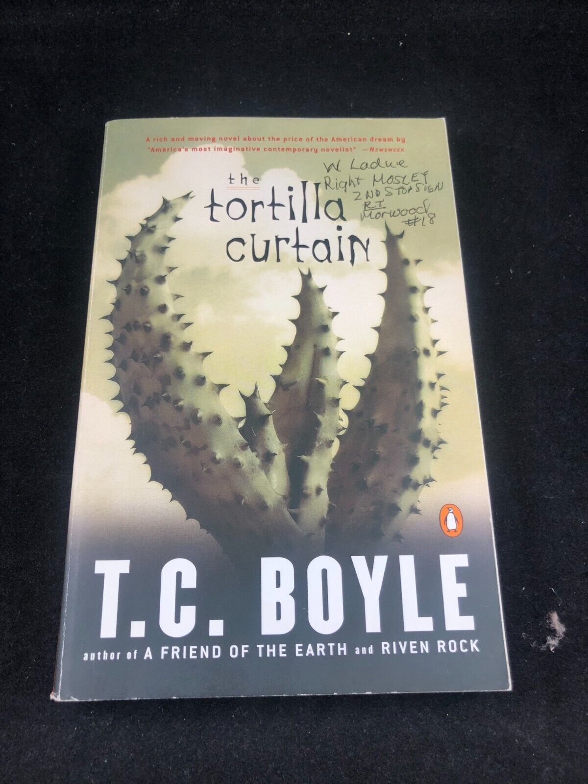 The Tortilla Curtain Paperback T. C. Boyle American Dream novel. Has writing